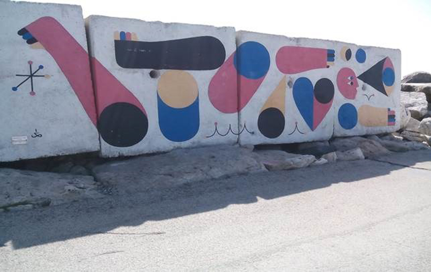 I colori della Street Art sui massi del molo di San Benedetto del Tronto